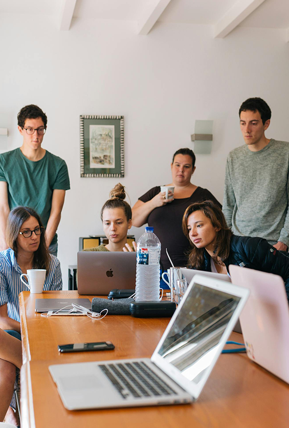 IT team working together to deliver reliable application support and development services.